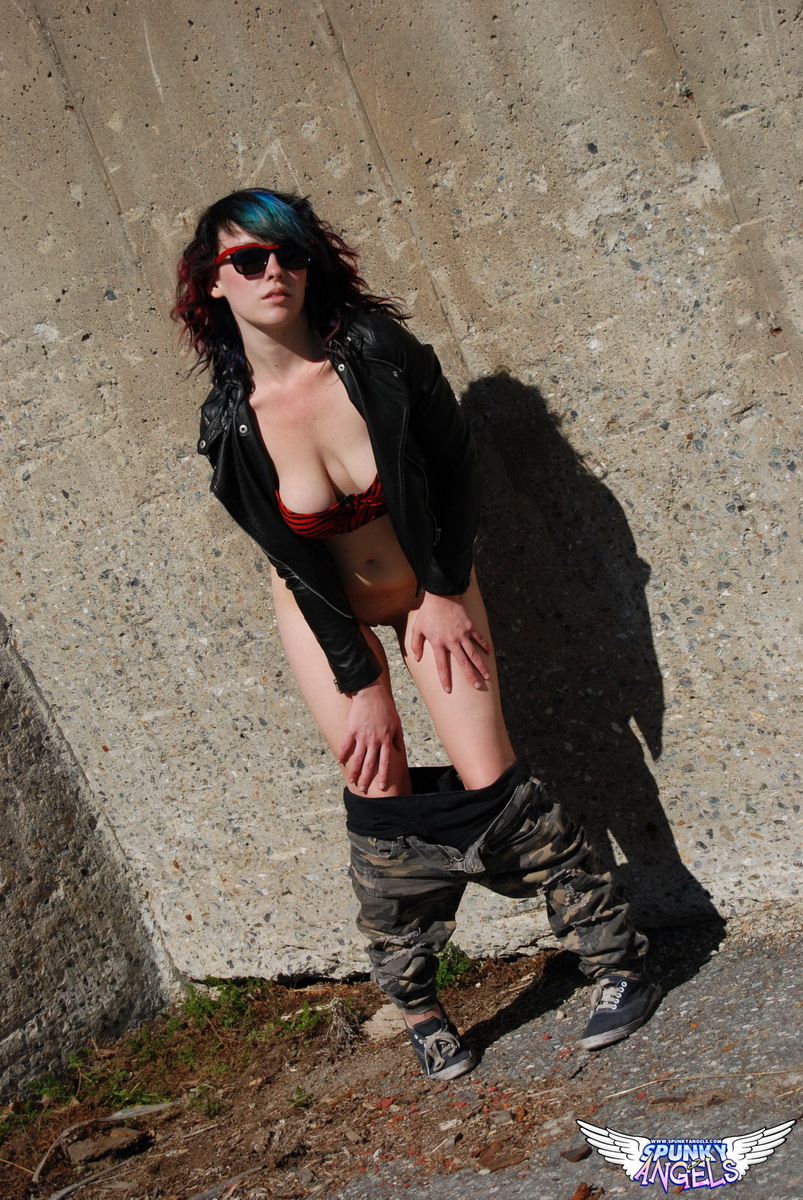 horny-tease-sabrina-shows-off-her-round-ass-outdoors-as-she-pulls-down-her-pants-in-the-warm-sun-12